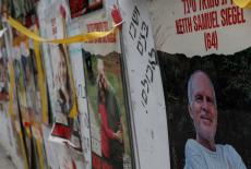 A view of a banner depicting Keith Siegel, who is a dual U.S. citizen seized during the October 7 attack on Israel and tak...